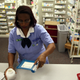 Rosemary Petty, a Publix Supermarket pharmacy technician, counts out a prescription of antibiotic pills August 7, 2007 in Miami, Florida.
